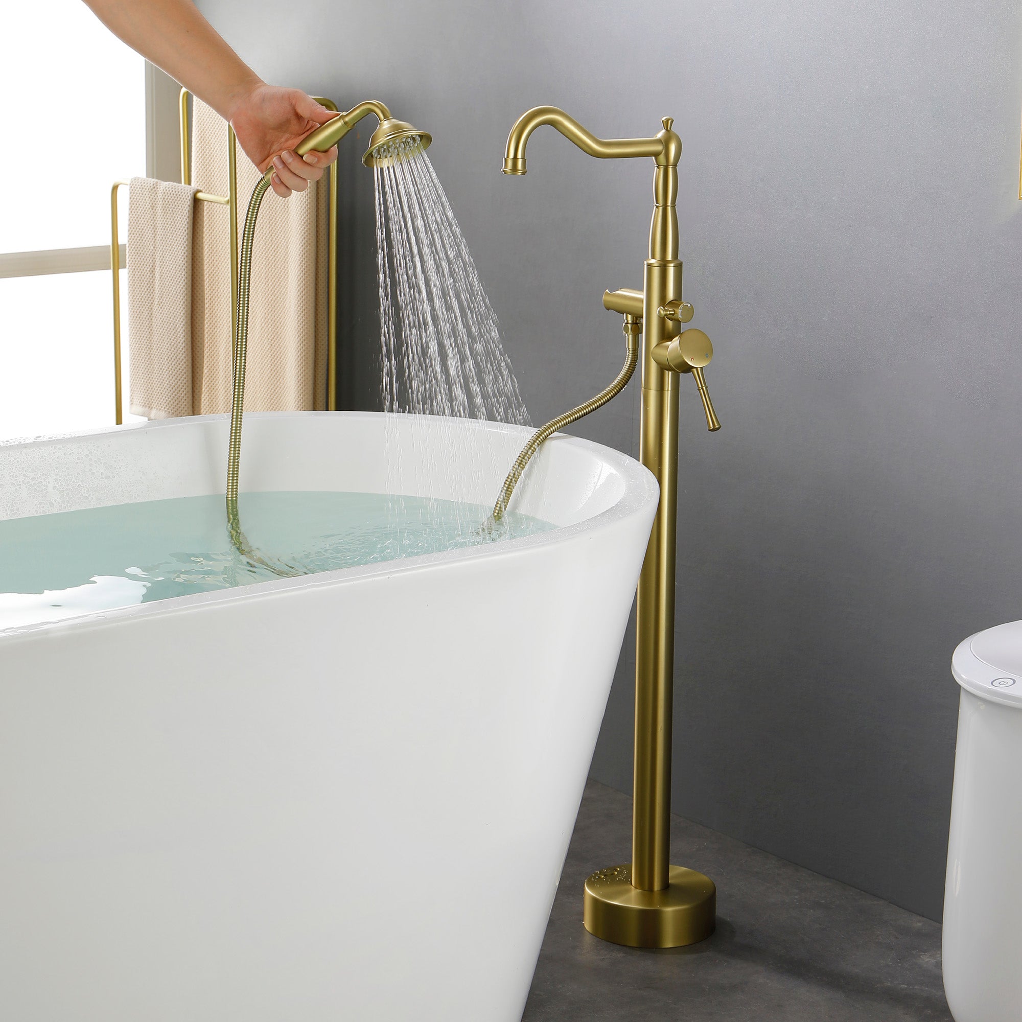 Freestanding Floor Mount Tub Filler with Handheld Shower Roman Bathtub Faucet by Finish, Swivel Spout with Brass Rough-in and Water Hose